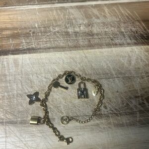 GWP Louis Vuitton Gold Charm Bracelet with Iconic Symbols